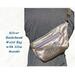 Silver Dachshubd waist pack with embroidered doxie on front panel.
